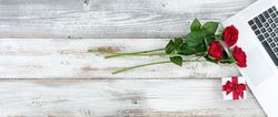 Overhead view of rustic desktop with Valentines day romance concept at work