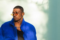 Stylish Black man in sunglasses on street