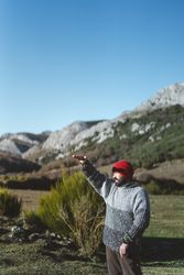 Man standing on valley and looking into distance