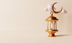 Lantern with lit candle with crescent moon, copy space