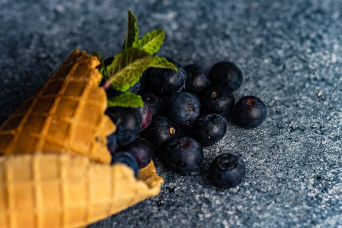 Waffle cone with fresh blueberries