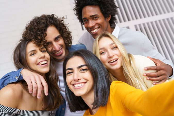 Friends posing for a selfie outside