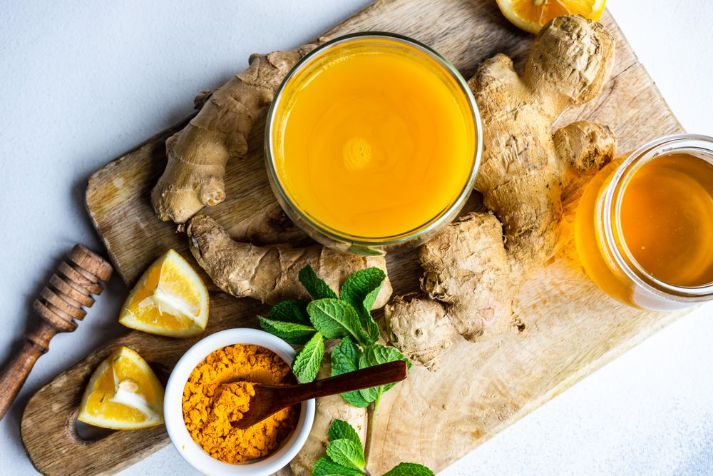 Top view of ingredients for detox tea on wooden board