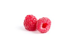 Fresh sweet raspberries isolated on blank background