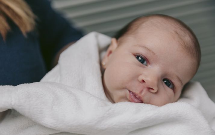 Baby girl looking at camera