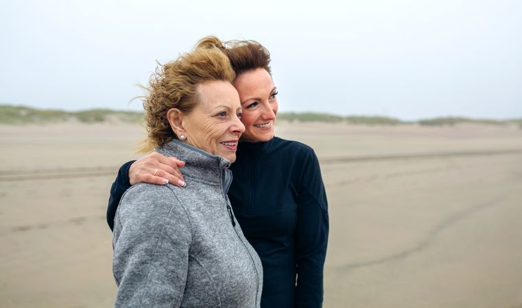 Two women looking at sea