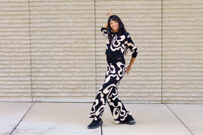 Cool woman dancing outside