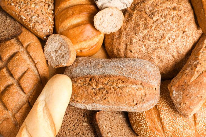 Different bakery products as background, closeup and top view