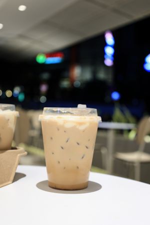 Iced Cloud Coffee in Plastic Cup at a Coffee Shop