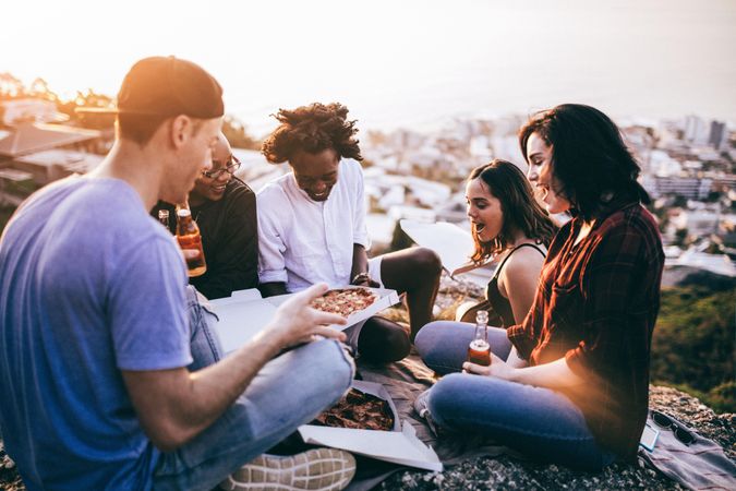 Group of friends sharing a pizza