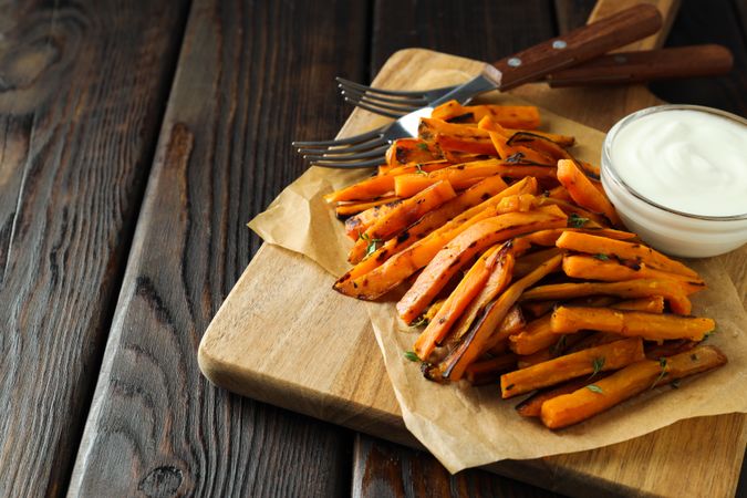 Concept of tasty food - sweet potato fries
