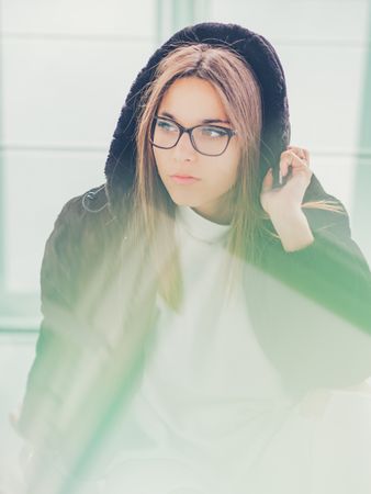Young woman over a glasses ground