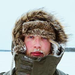 Portrait of man in fur coat
