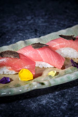 Fragment of plate with appetizing sushi
