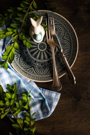Spring table setting with rabbit figuring on plate