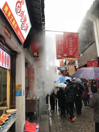 People walking down the market in Shanghai Shi, China