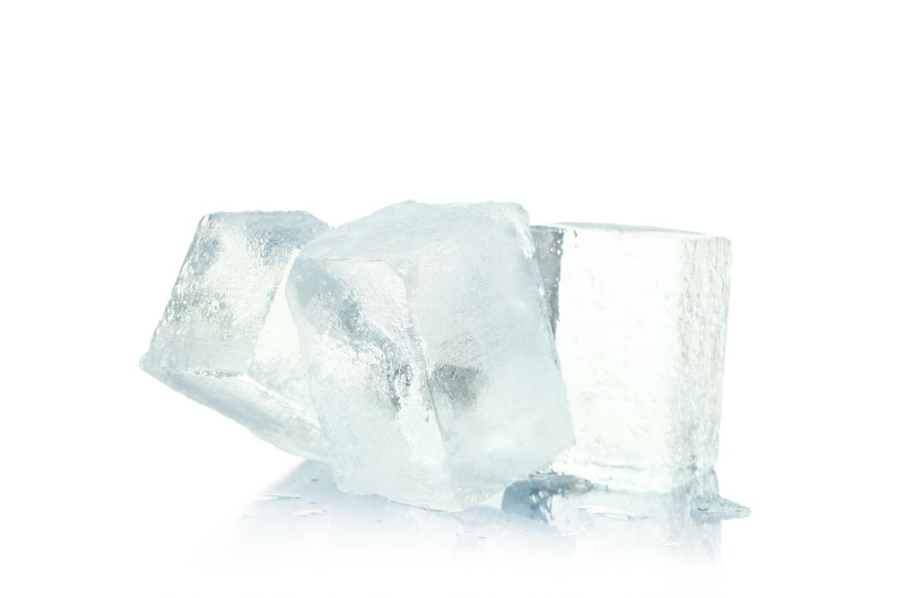 Clear ice cubes in bright room
