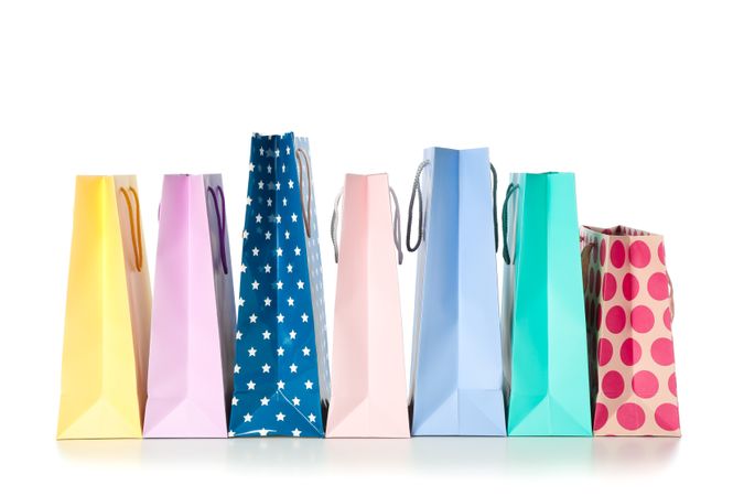 Multicolor paper bags isolated on blank background