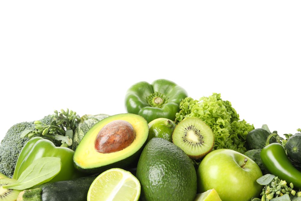 Bunch of green vegetables isolated on neutral background