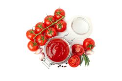 Tomatoes, sauce and ingredients isolated on light background