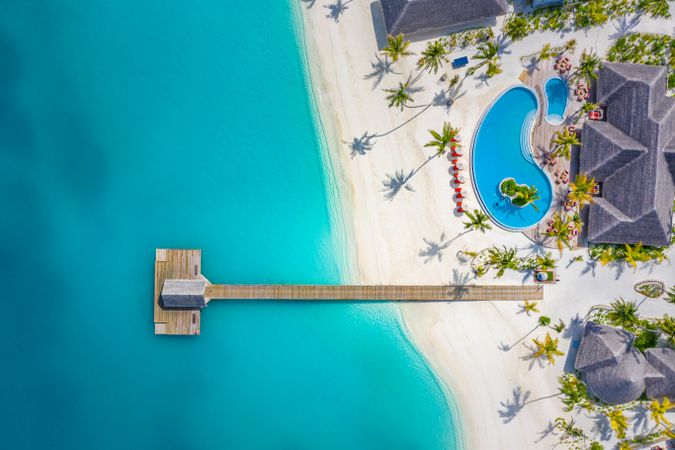 Aerial view of a pristine beach resort in the Maldives, landscape