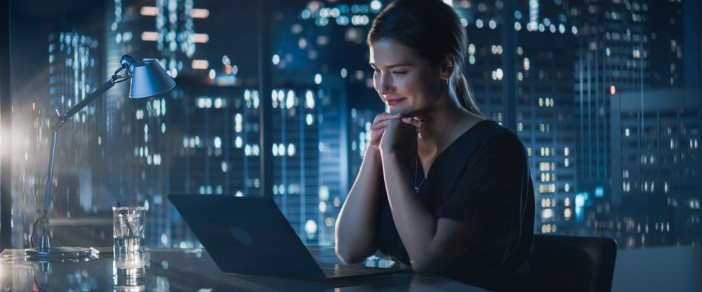 Office Video Call Conference Meeting: Portrait of Successful Young Businesswoman Using Computer to Talk with Investors, Partners