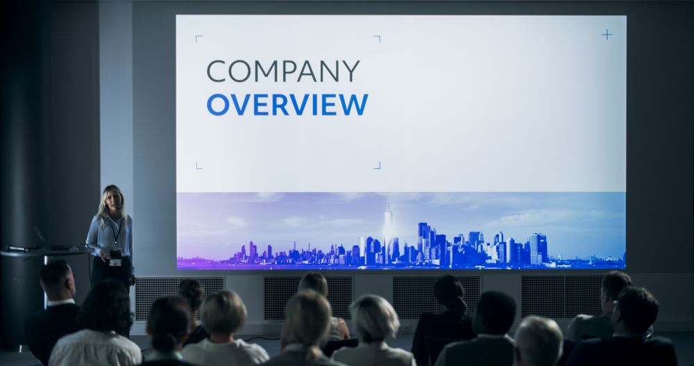 Corporate Event: White Female Tech CEO Giving Presentation To Colleagues or Investors In Conference Room Of Innovative Startup Company Office.