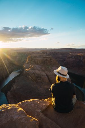 Bearded traveler looking at canyon