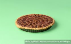 Pecan pie on a green table 5lNqVb