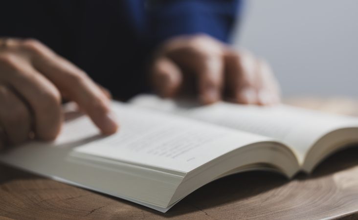 Man Reading Book Close-Up