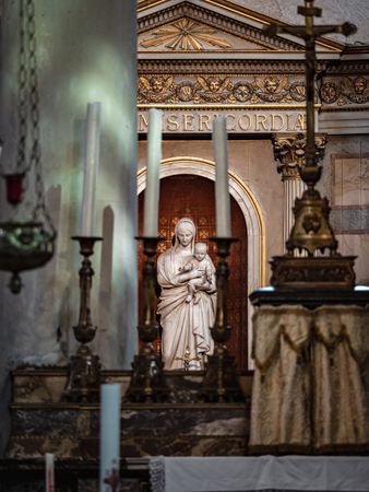 Ancient sculpture in one of the churches of Paris. Antique art.