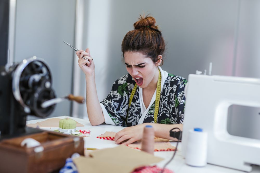 Woman in a sewing school