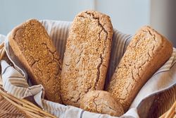 Appetizing healthy bread with sesame seeds in basket