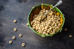 Breakfast bowl of cereal on wooden table