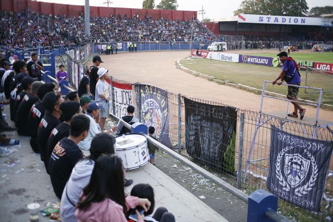 Kedira, East Java Indonesia - October 4, 2019: Stands full of fans at soccer game