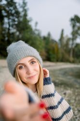 Smiling woman taking selfie