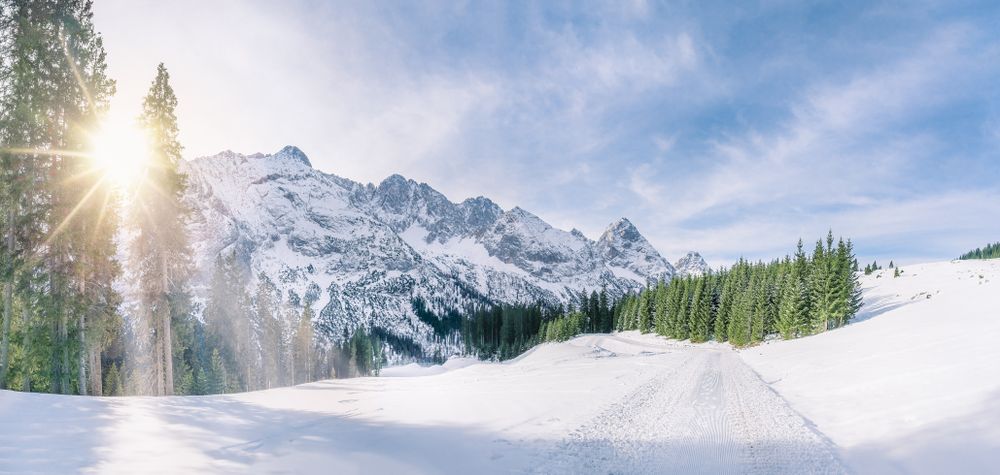 Winter sun in snowy alpine decor