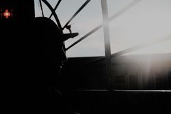 Modern man inside desolate building