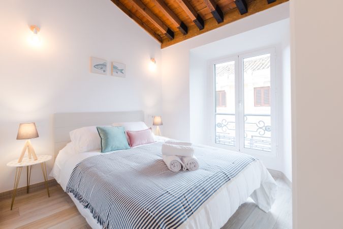 Cozy bedroom with big bed
