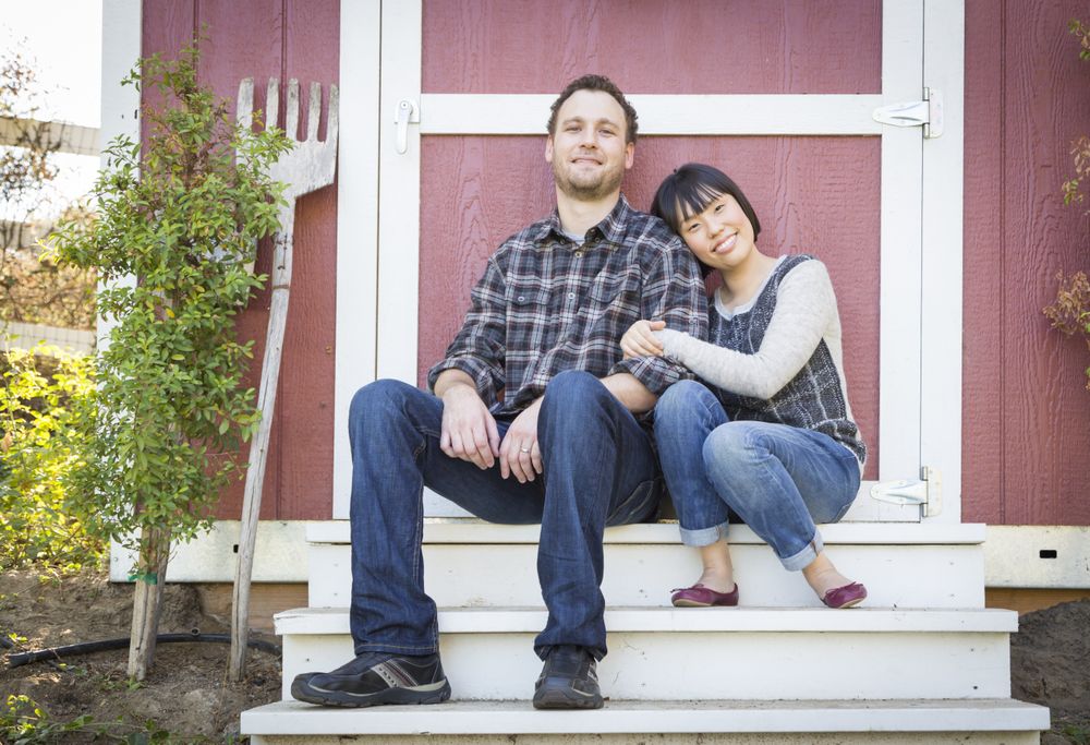 Interracial Couple Relaxing on the Steps