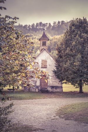 Autumn vintage image with an old German church in the background