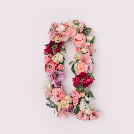Letter Q made of real natural flowers and leaves