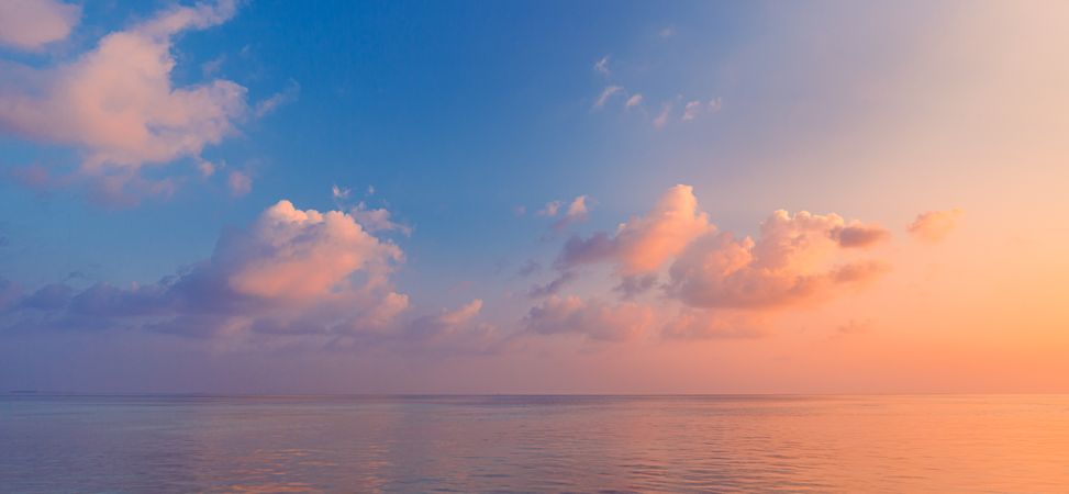 Colorful sunset under the Indian Ocean, wide