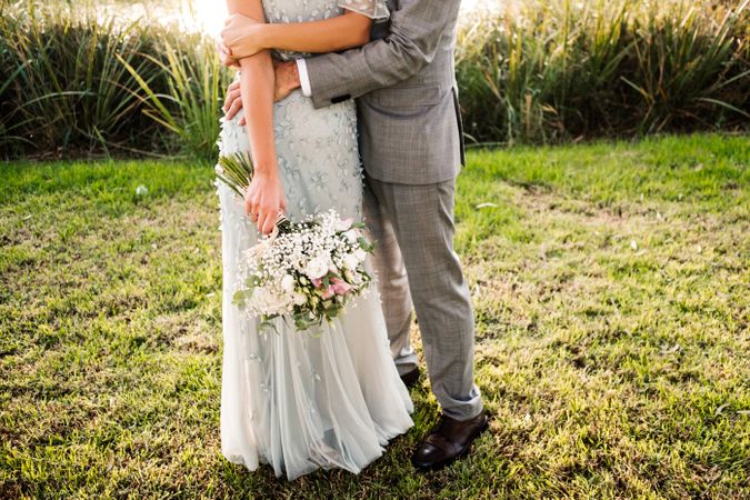 Happy newly wedded couple delighting in event at nature