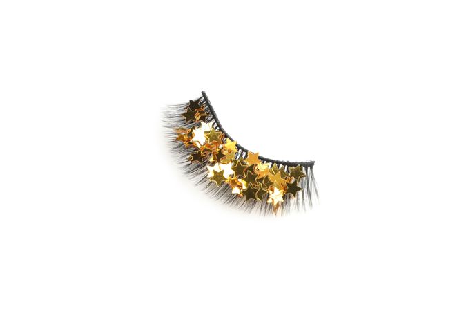concept of cosmetology tools, false eyelashes, isolated on light background