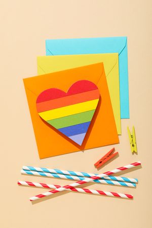 Pride parade concept, free love symbol on light background.