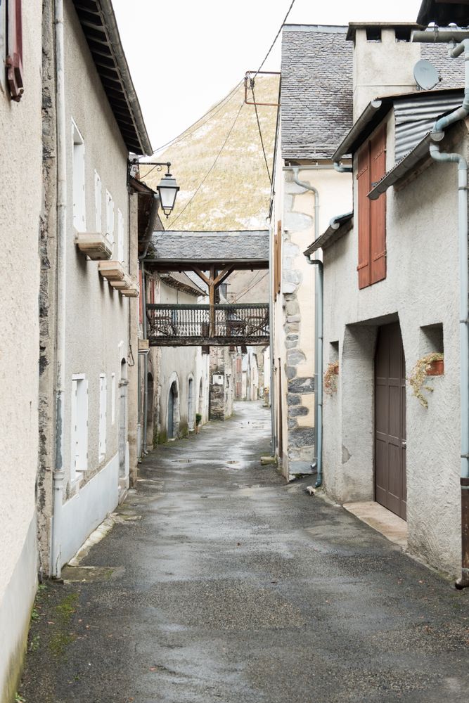 Old buildings in city near mountains