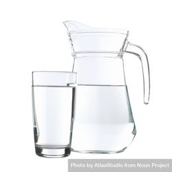Pitcher of water and glass in plain room 48Ydjb