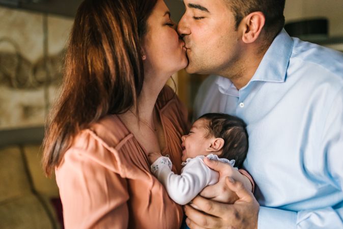 Happy family with newborn baby