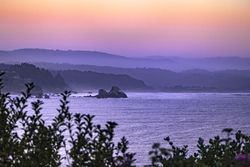 Calm west coast with beautiful gradient sky